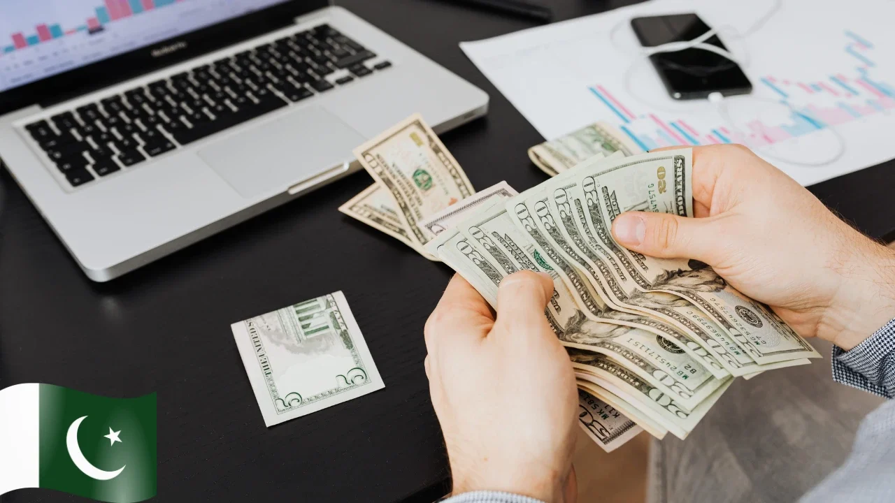 A financial analyst reviewing Pakistan interest rate forecast data on a computer screen